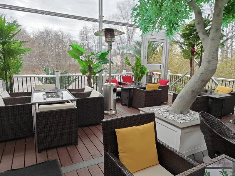 Lounge seating around a fire table on the deck